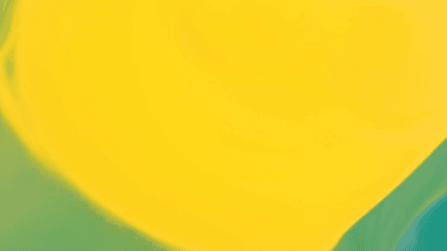 초록색과 노란색 액체가 혼합되는 추상적인 패턴