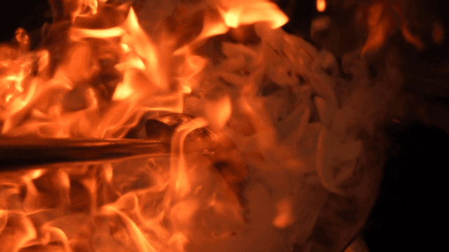 Vegetables stir-fried in hot wok