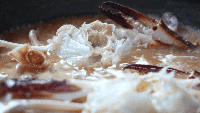 Crab stew cooking in pot