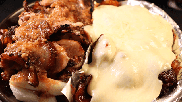 Grilled pig's trotters with melted cheese