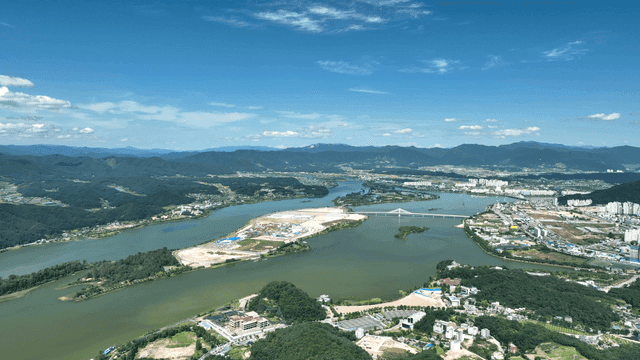 Aerial view of a river and cityscape