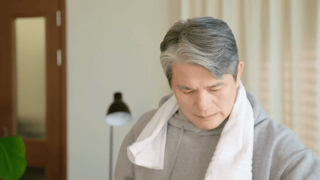 Man drinking a refreshing water indoors