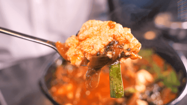 Spoonful of spicy soft tofu jjambbong