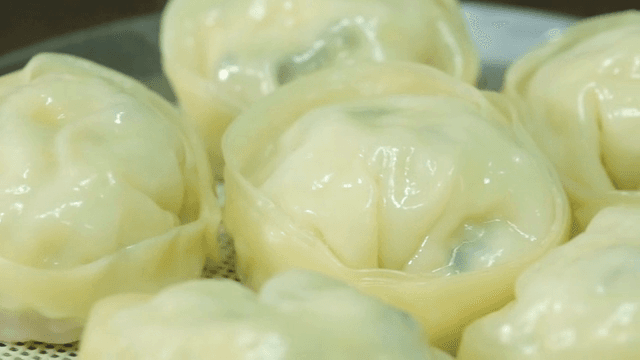 Steamed dumplings on a steamer