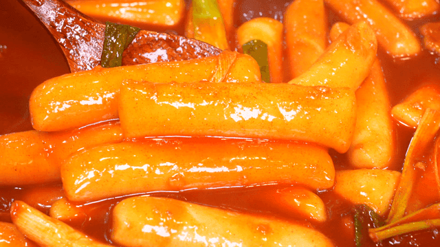 Spicy tteokbokki simmering in a pot