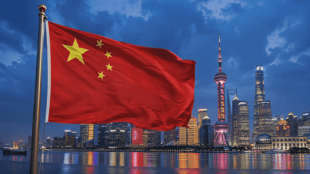 Chinese flag and city skyline