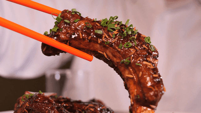 Delicious marinated ribs garnished with scallions