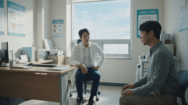 Doctor consulting with patient in office