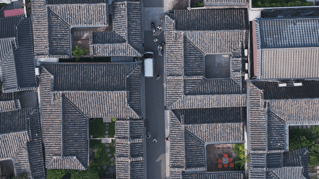 Traditional Hanok village with tiled roofs laid out in a grid pattern