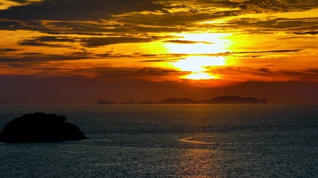 Calm Sea and Red Sky at Sunset