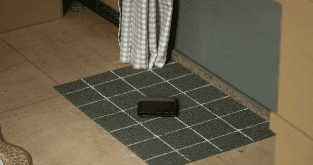 Wallet on checkered mat