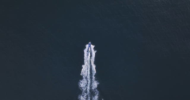 Boat sailing through the open sea