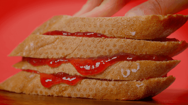 Slices of bread with strawberry jam