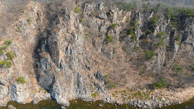 Rocky riverbank with clear water