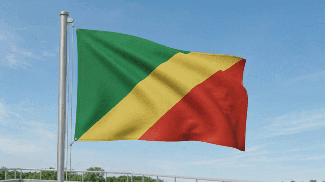 Flag of Republic of Congo fluttering against clear sky