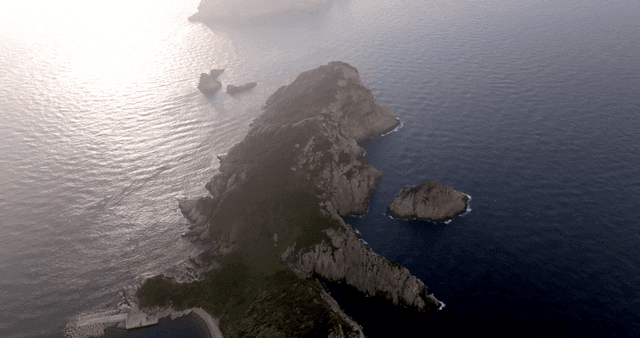 An island surrounded by calm sea