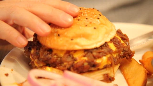 Hamburger with a juicy patty and cheese.