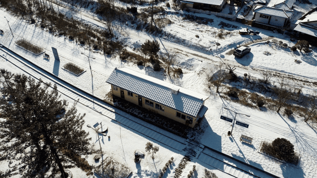 Snow-covered rural train station