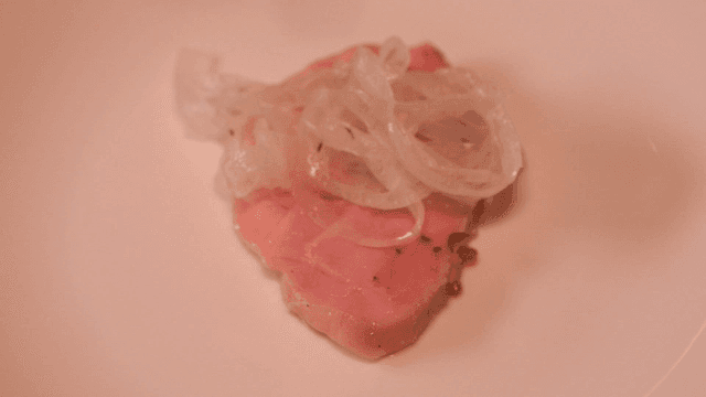 Sous vide sirloin slices with onions