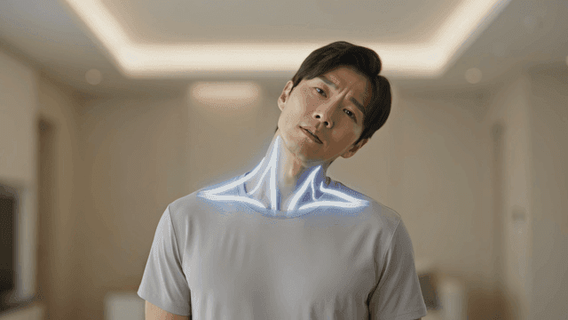 Man stretching his neck muscles because they hurt