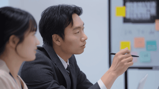 Office meeting with focused discussion