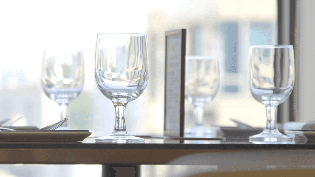Elegant table setting with wine glasses