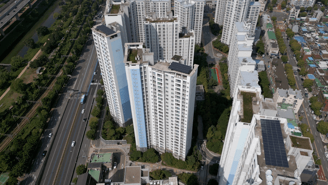 High-rise apartments and busy roads