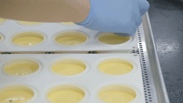 Batter being prepared in molds