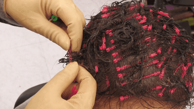 Hair permed at beauty salon