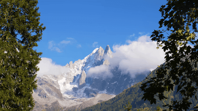 Snow-capped mountains with clouds