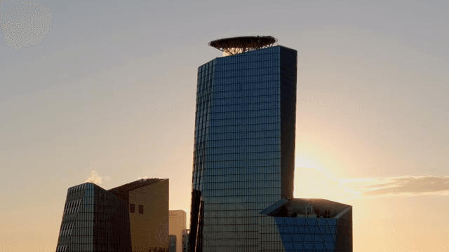 Sunset behind modern skyscrapers