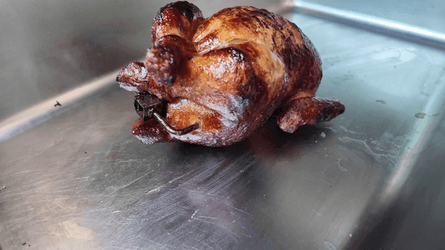 Roasted chicken on a metal tray