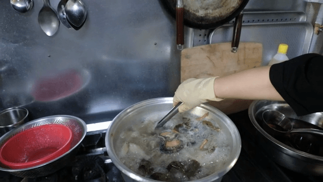 Octopus blanched in a boiling pot