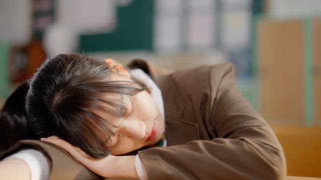 Student sleeping in a classroom