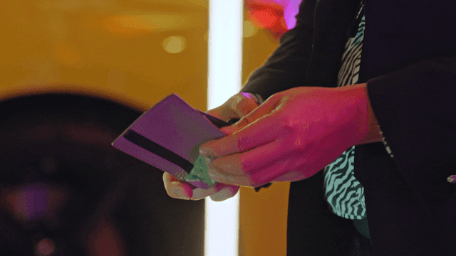 Man taking out cash from wallet