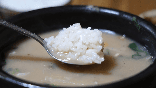 Beef soup with white rice mixed in