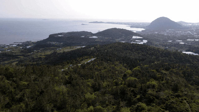 Scenery of blue mountains and sea