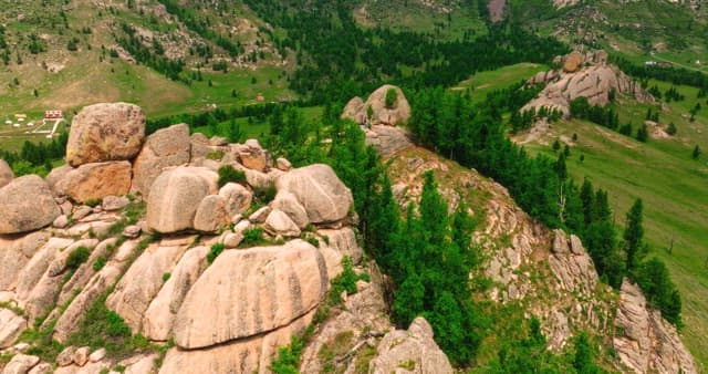 Person standing on a rocky mountain