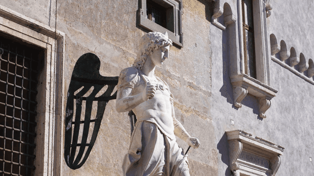 Statue of an angel on a historic building