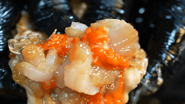 Fresh soy sauce marinated crab with bright orange roe
