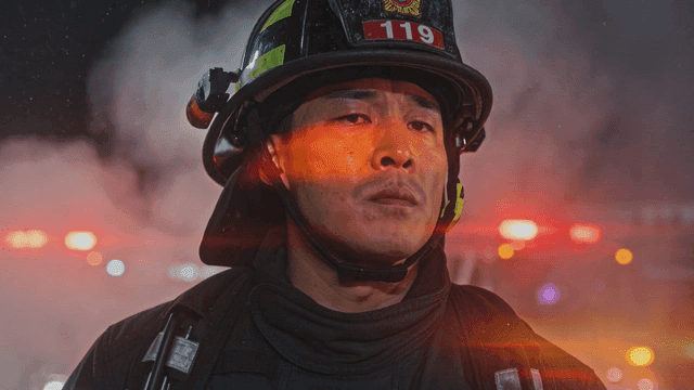 Firefighters in smoke and light