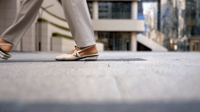 Women's shoes walking on city streets