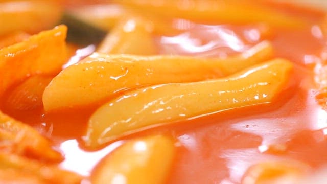 Spicy tteokbokki with spoon