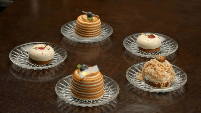 Various desserts on glass plates