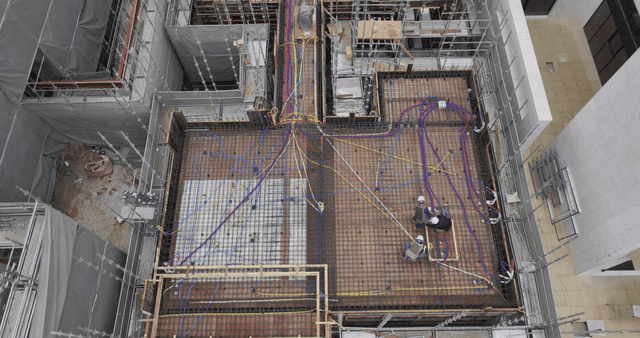 Construction site with scaffolding and workers