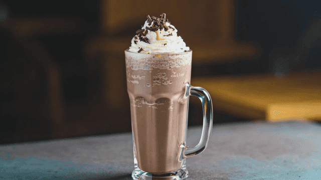 Chocolate milkshake topped with whipped cream