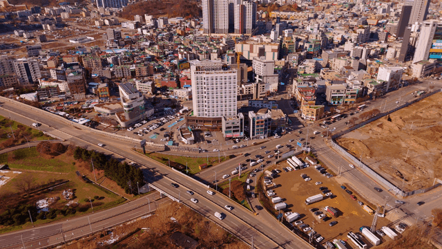 Bustling city with roads and buildings