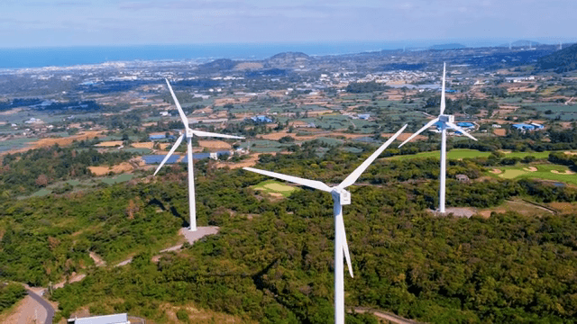 Wind turbines in a vast rural landscape