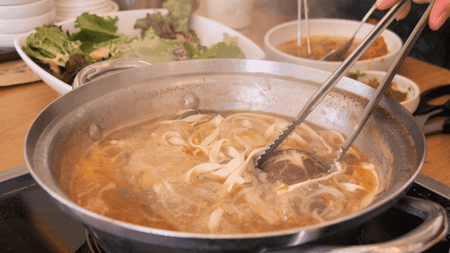 Hot pot with noodles and vegetables