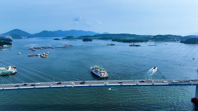 Aerial View of Bridge Over Scenic Coastline